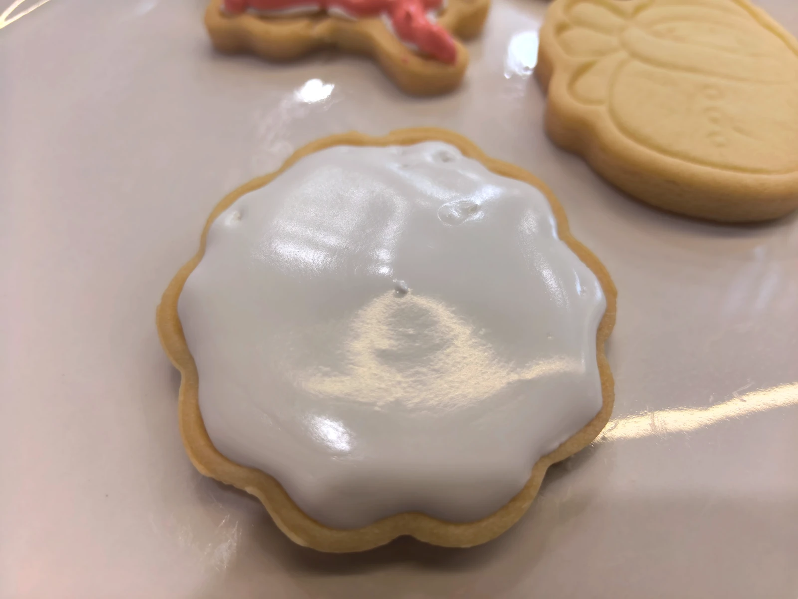 The same cookie photograph after a cooler global RGB adjustment, with the food and background geometry unchanged.