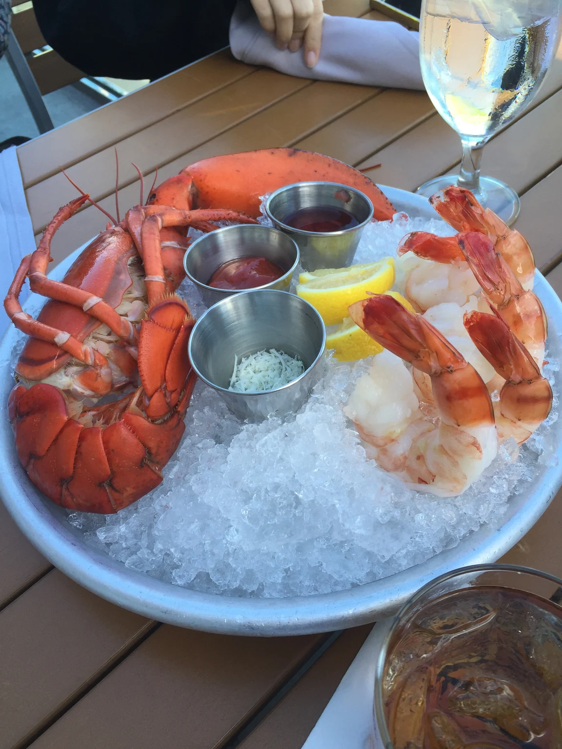 Actual vertical photograph of a seafood platter with the plate near the frame edges.