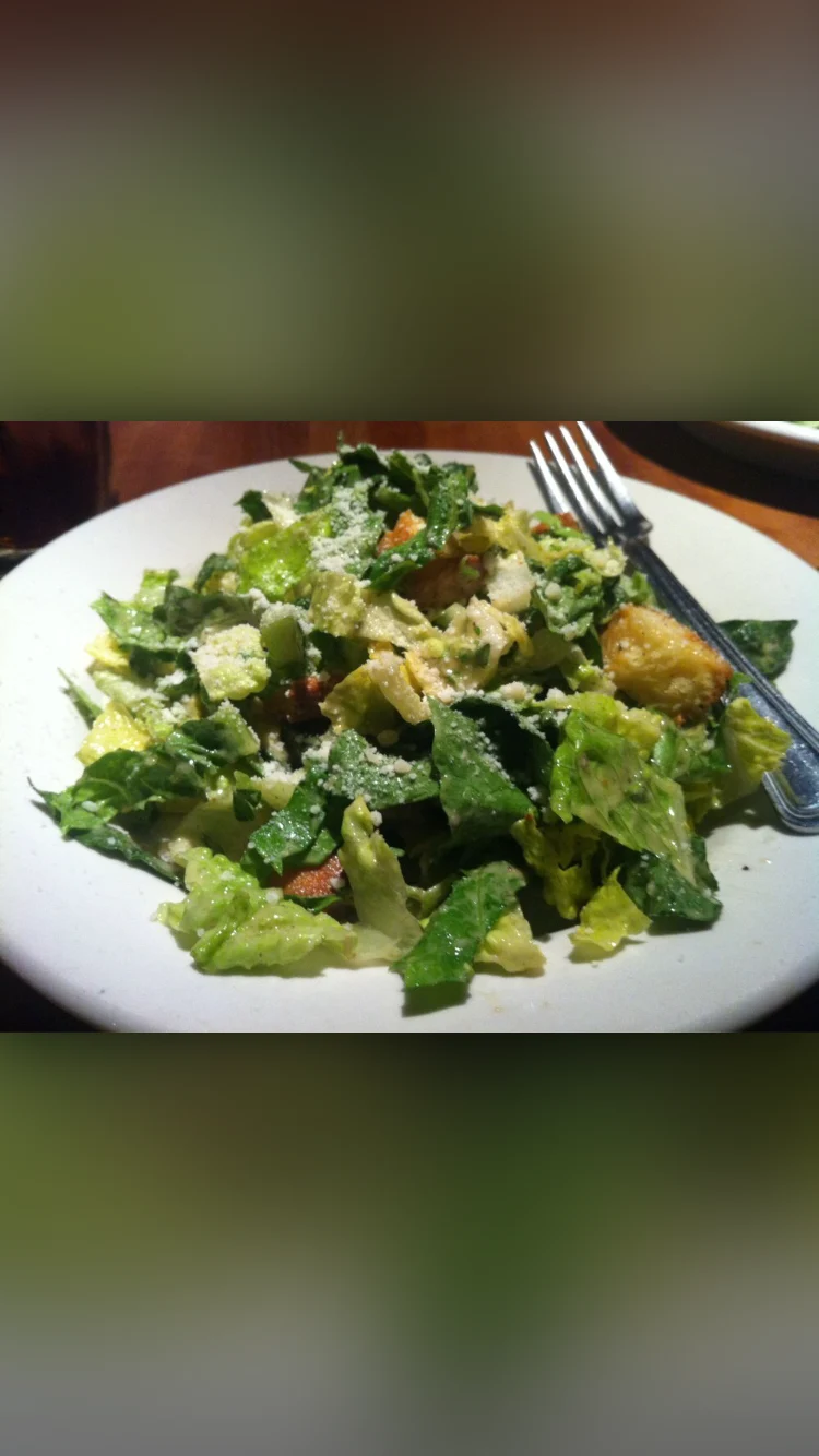 Actual portrait screenshot containing a food image with large blurred bands above and below it.