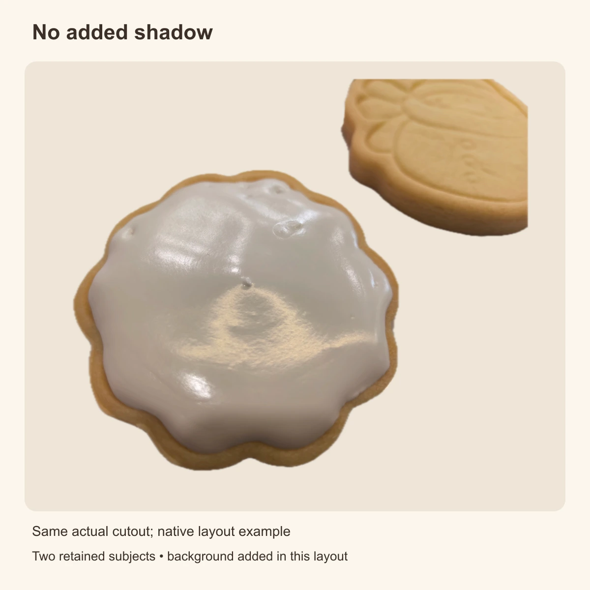 The same actual two-cookie cutout placed on a plain cream background without an added shadow.